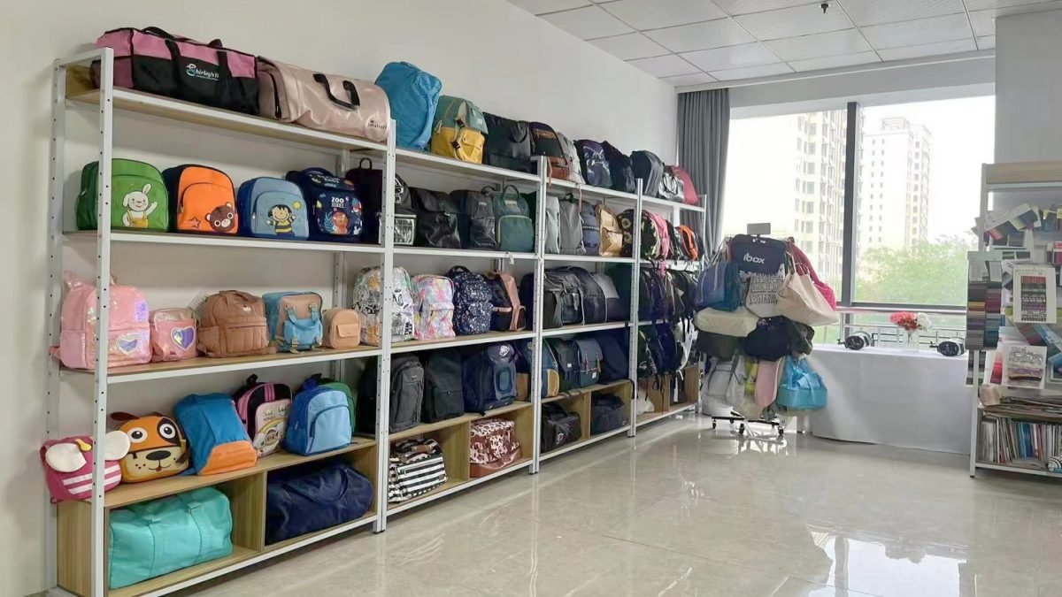 INEO sample room — finished bag samples on shelving for buyer review